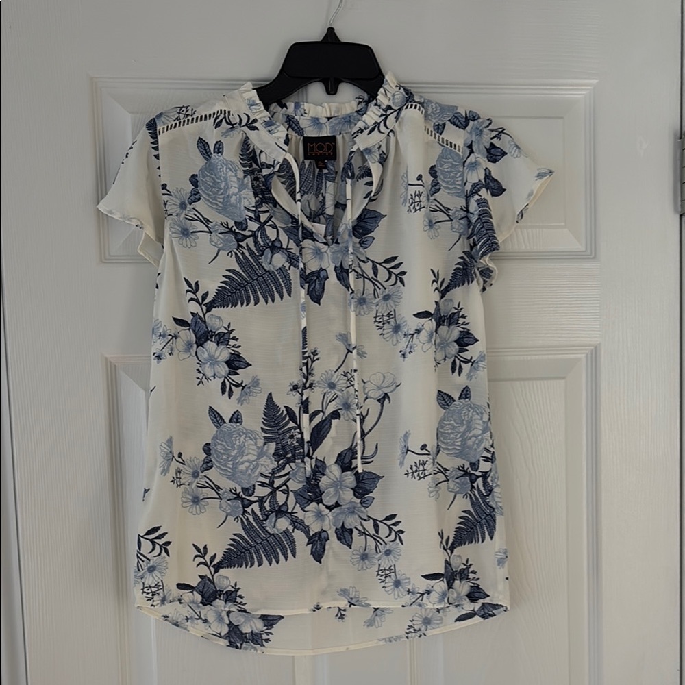 Elegant blue and white tie neck blouse by Mod Lusive